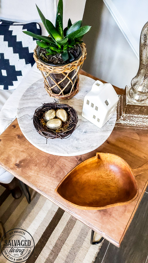 this list is full of amazing ways to decorate with wood bowls. Using wooden bowls in your decor is a great way to add vintage style, warmth, depth and texture to your home decorating. You can find wooden bowls in thrift stores and garage sales then use them in your home decor with this simple decorating ideas! #woodensaladbowl #vintagedecor #cozyhome #decoratingideas