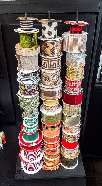 DIY ribbon storage idea to organize your craft room ribbons. This Ribbon storage rack idea is perfect for all the beautiful ribbons taking over your craft space that needs organizing! #ribbonstorage #wreathmaker #diyideas