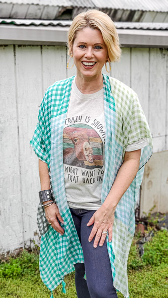 cute fashion over 40 for summer outfit ideas you will love if you are in the over forty club! Great graphic tees that pair well with jeans and a kimono for a classic summer outfit you can wear with confidence! #outfitideas #plussize #over50 #over40 #summeroutfitideas