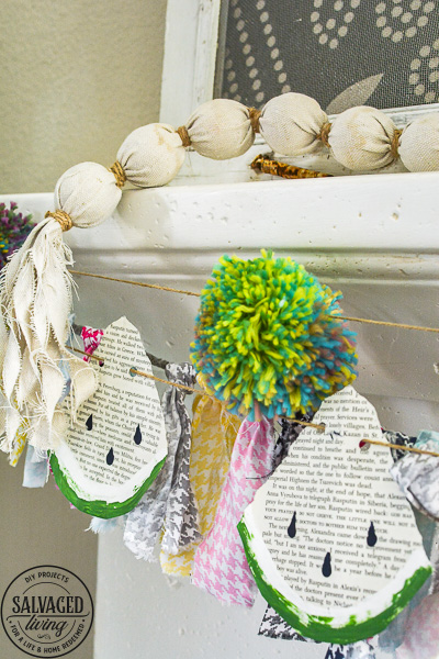 Make this DIY watermelon garland for your summer decor. This budget friendly summer craft is perfect for a summer mantel or summer tablescape! #summerdecor #summercraft #watermelondecor