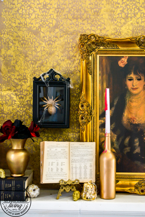 welcome to the Haunted Midas Mansion. These easy DIY Halloween mantel decoration ideas will inspire you to create an elegant Halloween home decor aesthetic that is a little bit vintage, kind of spooky and tons of fun. #indoorHalloween #Halloweendecorating #goldHalloweendecor 