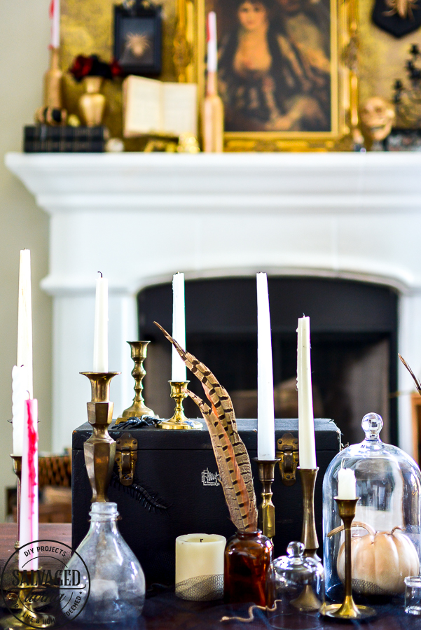 welcome to the Haunted Midas Mansion. These easy DIY Halloween mantel decoration ideas will inspire you to create an elegant Halloween home decor aesthetic that is a little bit vintage, kind of spooky and tons of fun. #indoorHalloween #Halloweendecorating #goldHalloweendecor 