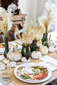 Are you wondering what to do with the floral glass vases you have hidden in your cabinet? Try this thrift store glass vase makeover. This DIY tutorial is easy and beautiful for a DIY glass vase centerpiece idea, great for fall decorating on a budget and creating home decor you can repurpose year round. #colorchange #thriftstoremakeover #glassvaseidea #glassmakeoverDIY