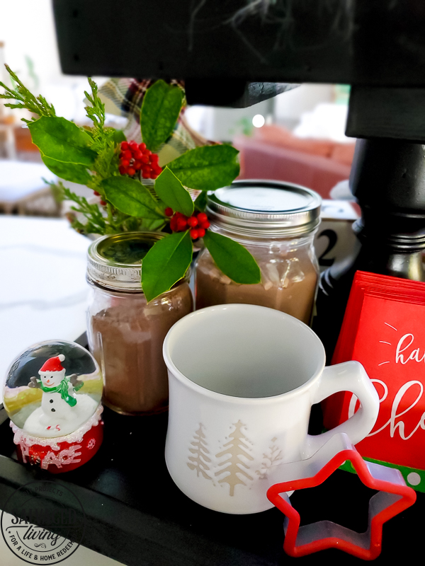 Get some fun and budget friendly Christmas hot chocolate bar ideas here! Everyone loves a good hot cocoa station for Christmas and the dollar store and Walmart are great spots for hot chocolate bar decor. Plus a few DIY projects to add to the mix! Have fun dressing up the perfect holiday beverage station! #hotchocolatebardideas #hotcocoabar #christmasdecorideas