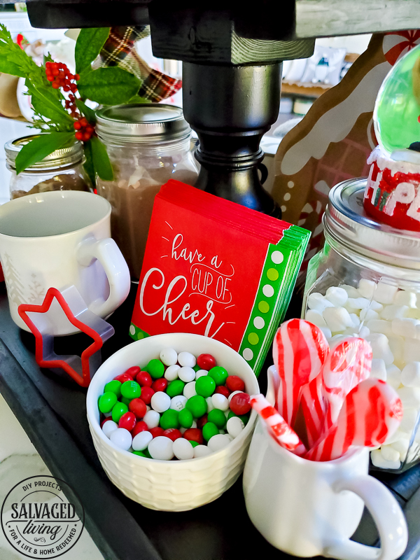 Get some fun and budget friendly Christmas hot chocolate bar ideas here! Everyone loves a good hot cocoa station for Christmas and the dollar store and Walmart are great spots for hot chocolate bar decor. Plus a few DIY projects to add to the mix! Have fun dressing up the perfect holiday beverage station! #hotchocolatebardideas #hotcocoabar #christmasdecorideas