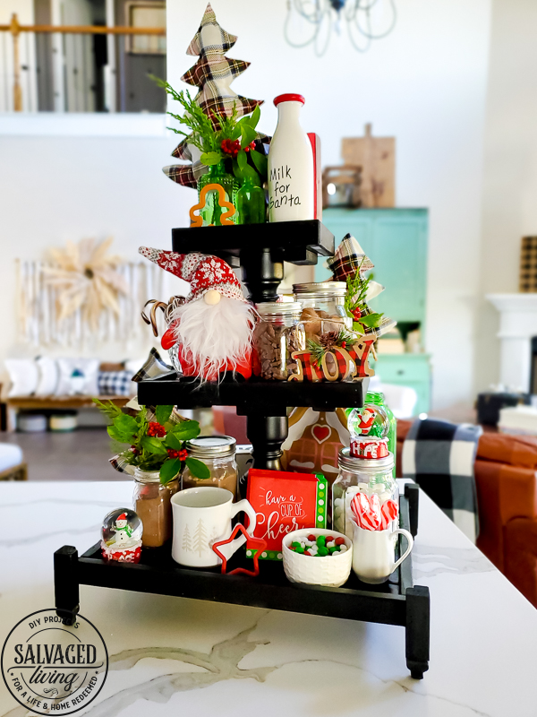 Get some fun and budget friendly Christmas hot chocolate bar ideas here! Everyone loves a good hot cocoa station for Christmas and the dollar store and Walmart are great spots for hot chocolate bar decor. Plus a few DIY projects to add to the mix! Have fun dressing up the perfect holiday beverage station! #hotchocolatebardideas #hotcocoabar #christmasdecorideas