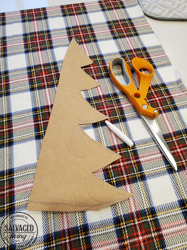 These DIY stuffed fabric Christmas trees make adorable, affordable Christmas decor, the perfect no sew Christmas fabric project! Pick your favorite holiday fabric and make a set of fabric Christmas trees to decorate any holiday vignette with. They are an awesome DIY Christmas gift too! #fabricChristmasornaments #fabricChristmascrafts #scrapfabricproject #DIYChristmas #Treecraft