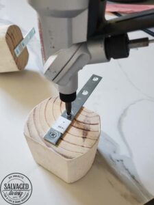 Learn how to make DIY scrap wood book ends with vintage finials. These book end DIY ideas are perfect for your budget home decor, make them fit your style, from farmhouse to modern vintage. #scrapwoodproject #bookendidea #trophyproject #bookshelfdecor