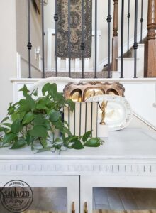 Learn how to make DIY scrap wood book ends with vintage finials. These book end DIY ideas are perfect for your budget home decor, make them fit your style, from farmhouse to modern vintage. #scrapwoodproject #bookendidea #trophyproject #bookshelfdecor