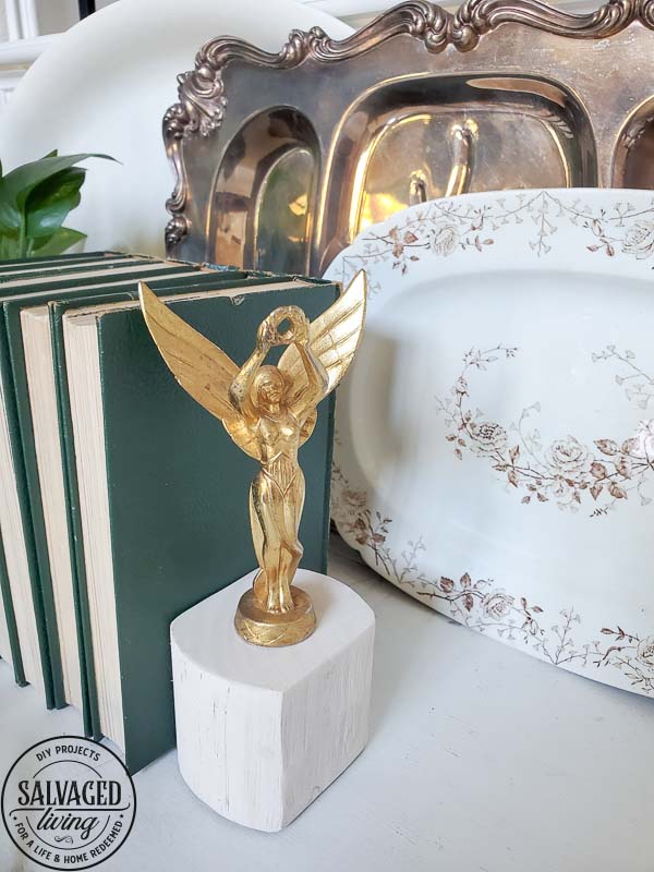 Learn how to make DIY scrap wood book ends with vintage finials.  These book end DIY ideas are perfect for your budget home decor, make them fit your style, from farmhouse to modern vintage. #scrapwoodproject #bookendidea #trophyproject #bookshelfdecor