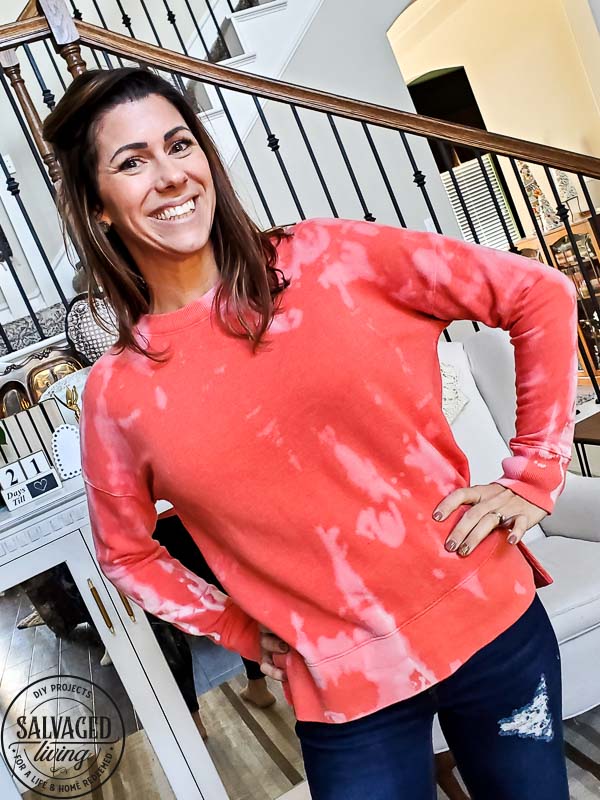 Learn how to bleach tie dye a sweatshirt with this simple video tutorial. Get a trendy bleach dyed shirt on a budget when you DIY it. This crafty clothing project is perfect to do with friends, family and kids. #bleachdye #tiedye #walmartclothing #budgetclothing