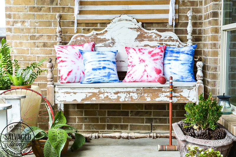 Create easy tie dye pillows with Testors fabric spray paint. This less mess tie-dye technique is so much easier than traditional tie-dye and gives you the same effect. This fabric paint dries soft and looks amazing for your holiday decor and pillows. Try this easy fabric craft for a multitude of craft ideas. #testors #testorscraft #crafttherapy #tiedye #fabricpainting #pillow #tiedyemethod #tiedyetechnique