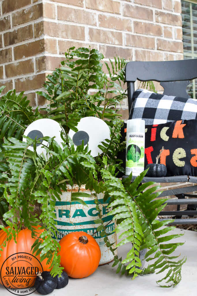 Create a spooky porch for Halloween with DIY glow-in-the-dark outdoor Halloween decor. Perfect for your plants and yard, these glow in the dark eyes bring your outdoor decorating to life! #rustoleum #rustoleumimagine #glowinthedark #halloween #halloweendecor #sponsored #outdoordecor #DIYHalloweencraft