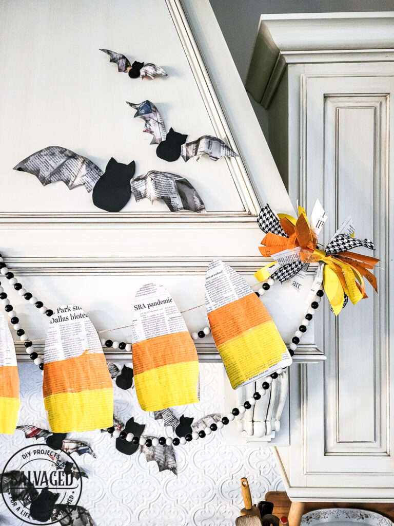 3 budget friendly DIY Halloween decorations are precious and so simple to make yourself. These Halloween decor ideas use newspaper as the main craft supply so you can create new Halloween decor that won't break the bank - turn those scary headlines into crafty decor instead! #papercraft #DIYHalloweenDecor #Halloweencraft #budgetHalloweenideas