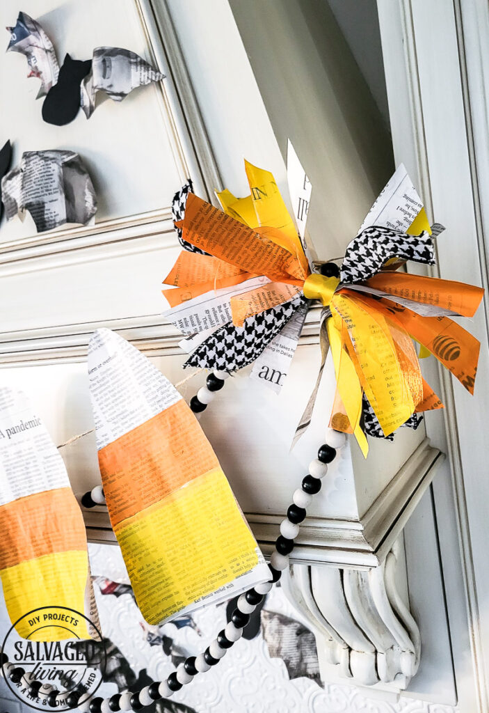 3 budget friendly DIY Halloween decorations are precious and so simple to make yourself. These Halloween decor ideas use newspaper as the main craft supply so you can create new Halloween decor that won't break the bank - turn those scary headlines into crafty decor instead! #papercraft #DIYHalloweenDecor #Halloweencraft #budgetHalloweenideas