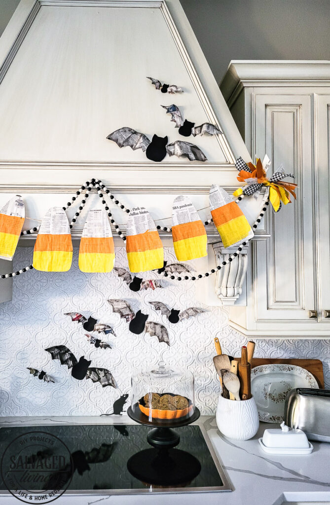 3 budget friendly DIY Halloween decorations are precious and so simple to make yourself. These Halloween decor ideas use newspaper as the main craft supply so you can create new Halloween decor that won't break the bank - turn those scary headlines into crafty decor instead! #papercraft #DIYHalloweenDecor #Halloweencraft #budgetHalloweenideas