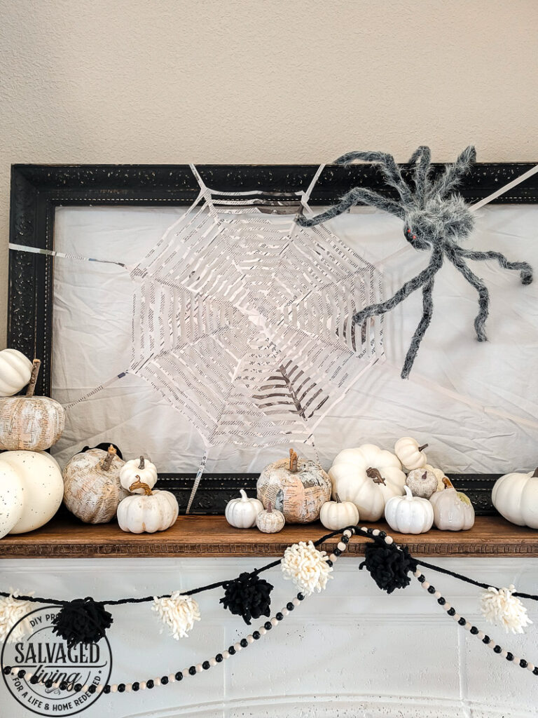 Three Halloween craft ideas to bring your Halloween mantel to life on a budget. These Halloween decor ideas are perfect for the crafty, budget friendly decorator to have a neautral farmhouse style Halloween decor that won't break the bank! Make a paper spider web, newspaper pumpkins and a precious witch's broom. #halloweenDIY #budgetHalloween #Halloweenpapercrafts