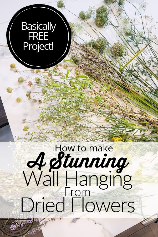 Make a stunning wall hanging from dried flowers and dried grasses for you a boho chic wall hanging in your home. This simple DIY is budget-friendly decor at it's finest! #wallart #driedflowers #bohodecor #farmhousewallart 