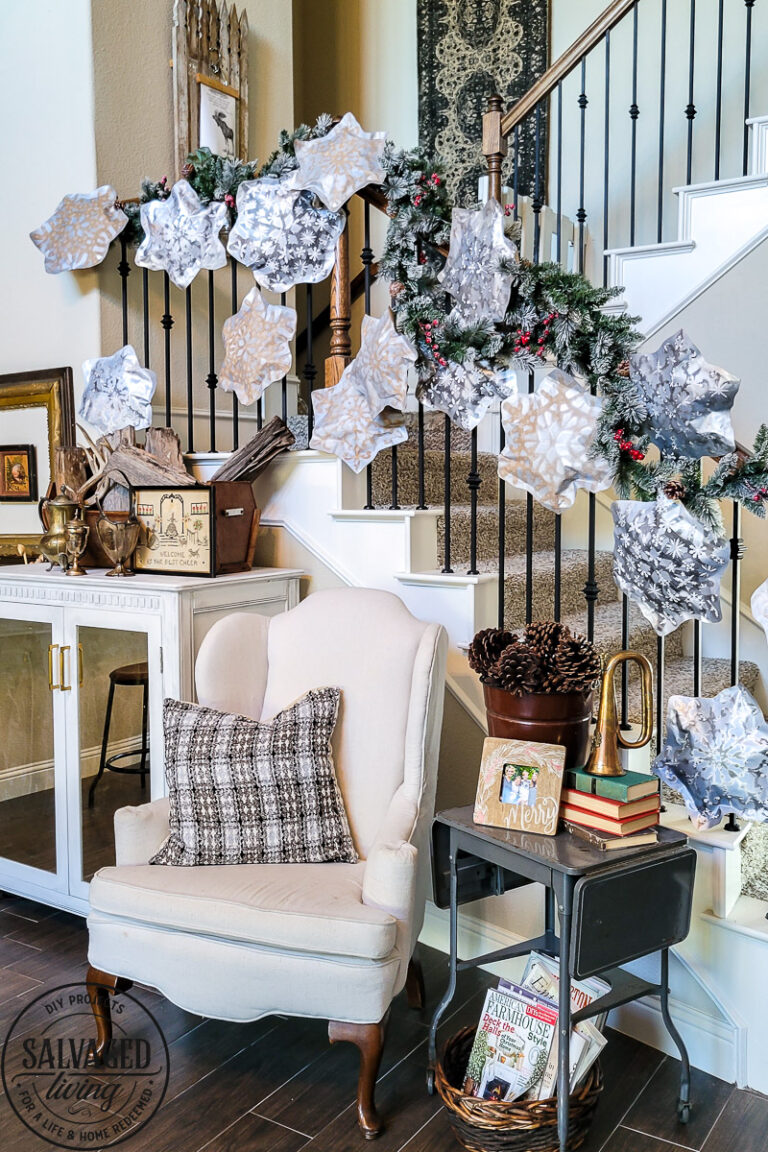 This simple DIY snowflake garland from dollar store felt pieces and Rust-Oleum Imagine spray paint is the perfect winter wonderland addition. Bring a flurry of snow to your holiday home decor with a papercraft for any decor style. #rustoleum #rustoleumimagine #snowflake #winterwonderland #holidaydecor #holidaydecorating #christmasdecor #sponsored