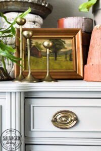 Found this vintage buffet side board at a garage sale and am sharing how to makeover a buffet! There are a few furniture painting tips along with some how to styling tips and inspiration for you here! ENjoy. #thriftedfurniture #paintedfurniture #vintagestyle #vignettestyling #painting tips #decortips