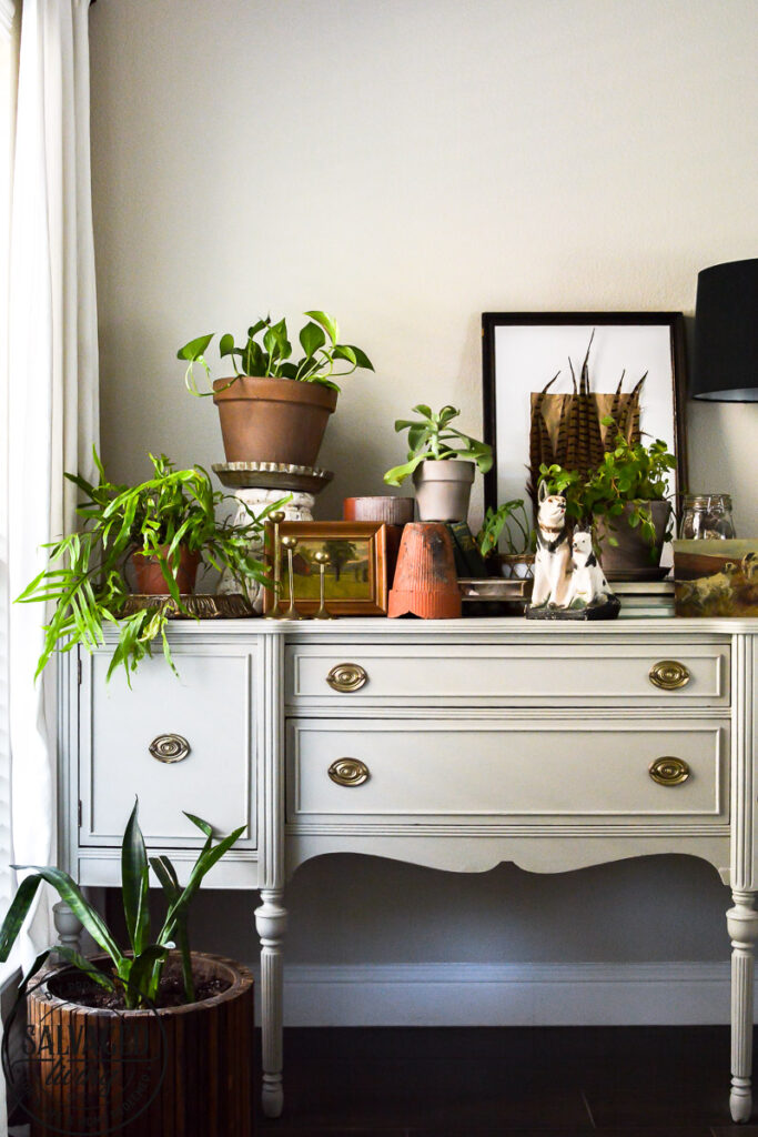 Found this vintage buffet side board at a garage sale and am sharing how to makeover a buffet! There are a few furniture painting tips along with some how to styling tips and inspiration for you here! ENjoy. #thriftedfurniture #paintedfurniture #vintagestyle #vignettestyling #painting tips #decortips