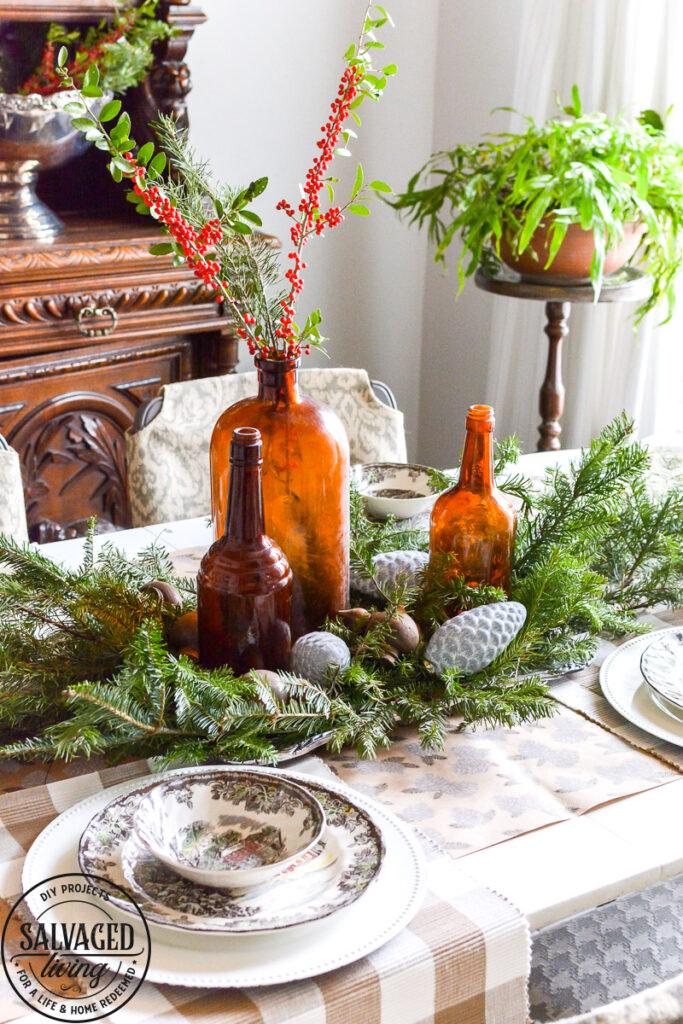 It's Christmas in the dining room, we decorated the peg board with vintage finds and real tree trimmings for an affordable and stylish Christmas feel on a budget. This peg board decorated for Christmas has all the holiday feels for a rustic, neutral Christmas decor vibe. #naturalChristmas #RusticChristmas #vintageChristmas #brownChristmas