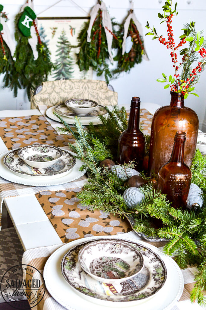 It's Christmas in the dining room, we decorated the peg board with vintage finds and real tree trimmings for an affordable and stylish Christmas feel on a budget. This peg board decorated for Christmas has all the holiday feels for a rustic, neutral Christmas decor vibe. #naturalChristmas #RusticChristmas #vintageChristmas #brownChristmas