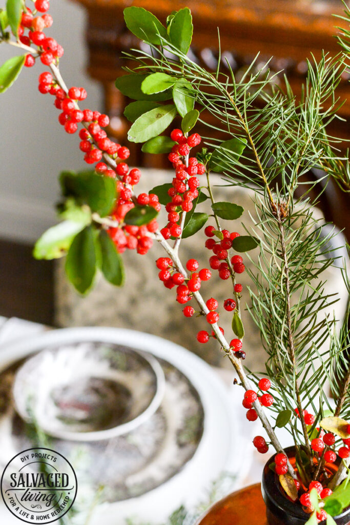 It's Christmas in the dining room, we decorated the peg board with vintage finds and real tree trimmings for an affordable and stylish Christmas feel on a budget. This peg board decorated for Christmas has all the holiday feels for a rustic, neutral Christmas decor vibe. #naturalChristmas #RusticChristmas #vintageChristmas #brownChristmas