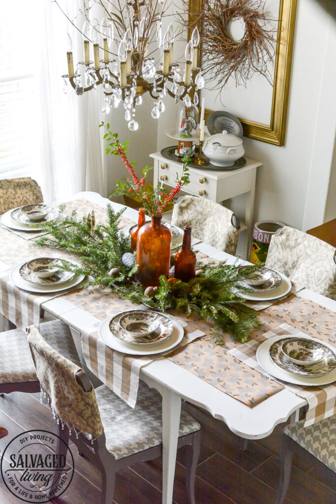 It's Christmas in the dining room, we decorated the peg board with vintage finds and real tree trimmings for an affordable and stylish Christmas feel on a budget. This peg board decorated for Christmas has all the holiday feels for a rustic, neutral Christmas decor vibe. #naturalChristmas #RusticChristmas #vintageChristmas #brownChristmas