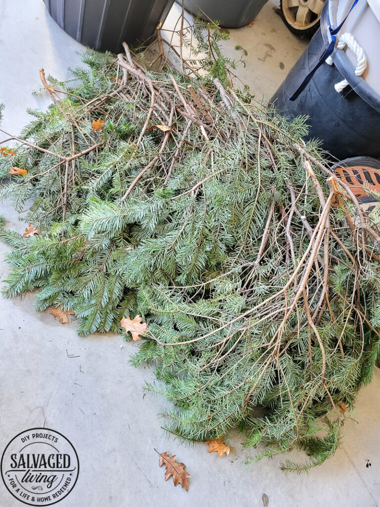 It's Christmas in the dining room, we decorated the peg board with vintage finds and real tree trimmings for an affordable and stylish Christmas feel on a budget. This peg board decorated for Christmas has all the holiday feels for a rustic, neutral Christmas decor vibe. #naturalChristmas #RusticChristmas #vintageChristmas #brownChristmas