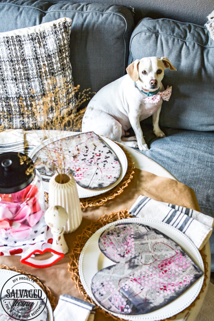 Get ideas for a simple Valentine's Day table you can create with a dollar store item and fun layering. A Valentine's Day table doesn't have to cost a lot, it can be cheap and cute! #valentinesdayinspiration #valentinesdaydollarstore #valentinesdecorideas