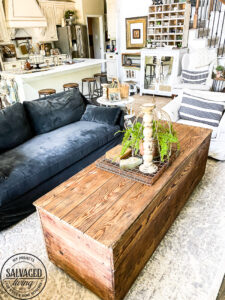 I found a great garage sale find - this $10 quilt box got a refresh and made it to my living room for a new coffee table that adds a cozy vintage vibe to the living area! #garagesale furniture #cozylivingroom #coffeetableidea