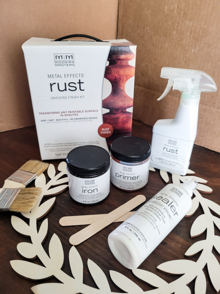 Learn how to rust wood or rust any surface with this amazing product and technique. Rust new things like wood and dollar store bells for gorgeous decor that feels old and vintage. You can make new things old with rust! #DIYdecor #rustychippy #rustfinish #painting technique #paintideas