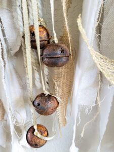Learn how to rust wood or rust any surface with this amazing product and technique. Rust new things like wood and dollar store bells for gorgeous decor that feels old and vintage. You can make new things old with rust! #DIYdecor #rustychippy #rustfinish #painting technique #paintideas