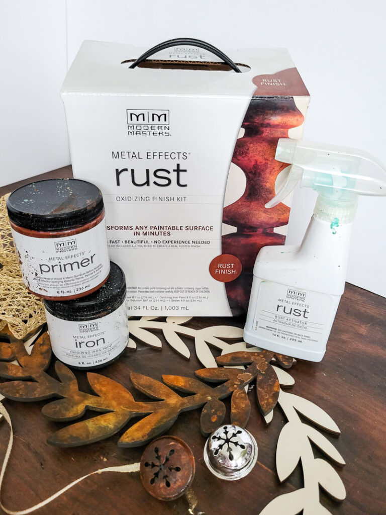 Learn how to rust wood or rust any surface with this amazing product and technique. Rust new things like wood and dollar store bells for gorgeous decor that feels old and vintage. You can make new things old with rust! #DIYdecor #rustychippy #rustfinish #painting technique #paintideas