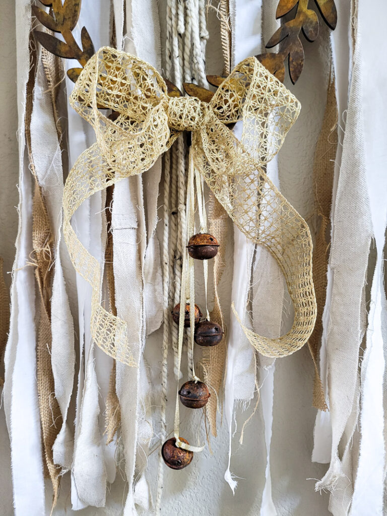 Learn how to rust wood or rust any surface with this amazing product and technique. Rust new things like wood and dollar store bells for gorgeous decor that feels old and vintage. You can make new things old with rust! #DIYdecor #rustychippy #rustfinish #painting technique #paintideas