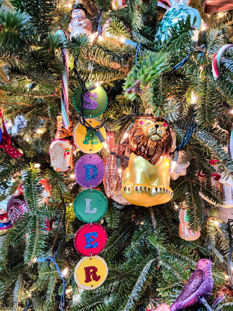 DIY cardboard gingerbread mantel ideas for your budget friendly Christmas decor. Paper crafting for Christmas is easy, gingerbread men and candy canes make this home full of child like joy for the holiday season! #gingerbreadcraft #papercraft #cardboardcraft