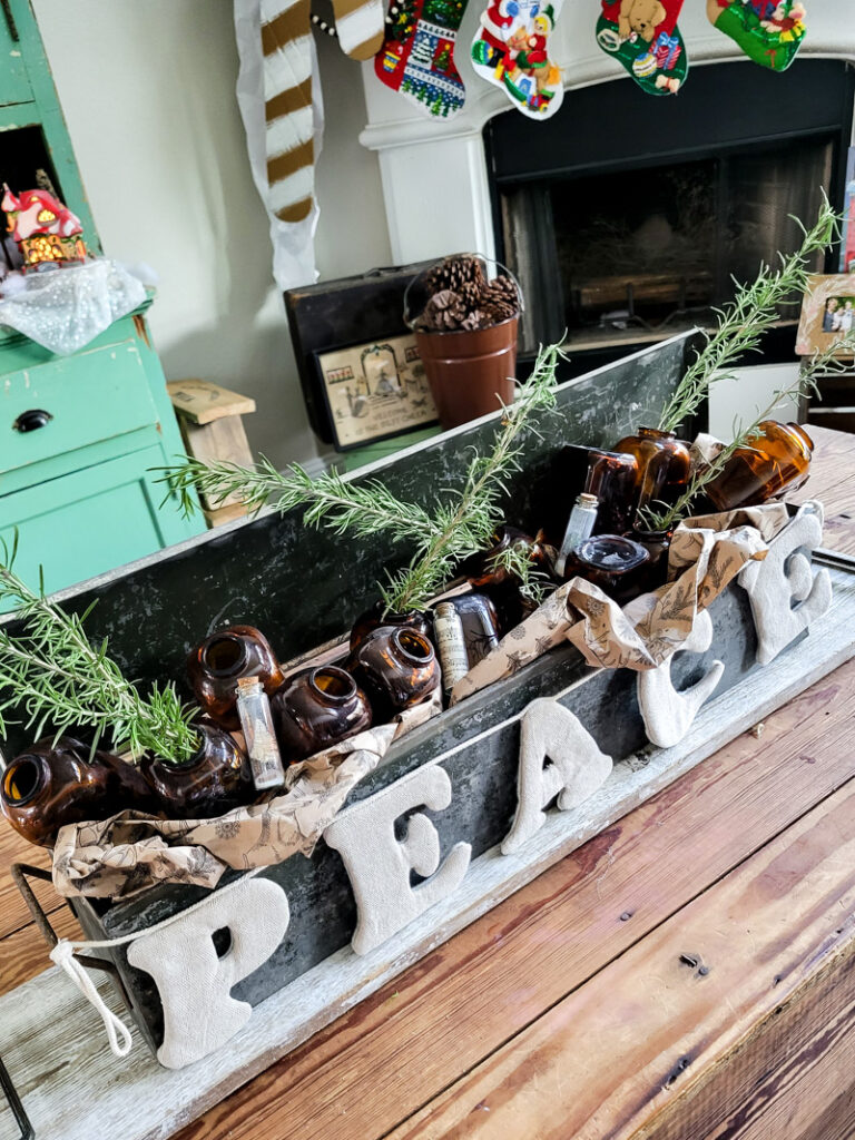 DIY cardboard gingerbread mantel ideas for your budget friendly Christmas decor. Paper crafting for Christmas is easy, gingerbread men and candy canes make this home full of child like joy for the holiday season! #gingerbreadcraft #papercraft #cardboardcraft