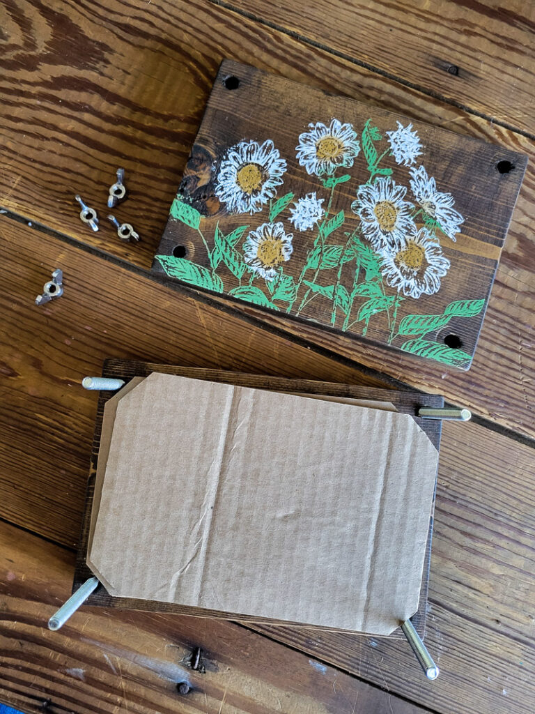 how to make a flower press. This DIY flower press tutorial will tell you how to make your flower press that works to create dried flowers you can craft and decorate with but it also looks good doing it! #driedflowers #flower press #journalart 