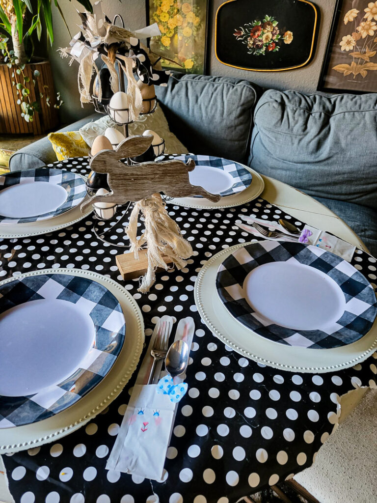 Use a lunch sack to create the cutest DIY utensil holders for Easter! This is the perfect craft to do with your kids, and use them all season before trashing them-- guilt free! #kidcraft #easterdiy #easyeastercraft