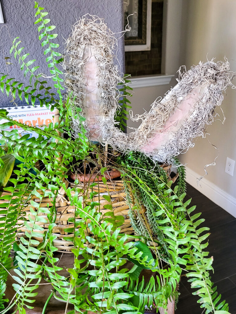 Watch cardboard get a mulligan as we recycle it into beautiful spring and easter decor in a matter of minutes! #easterdecor #springdecor #cardboardrecycle #easydiy #budgetfriendlyeasterdecor