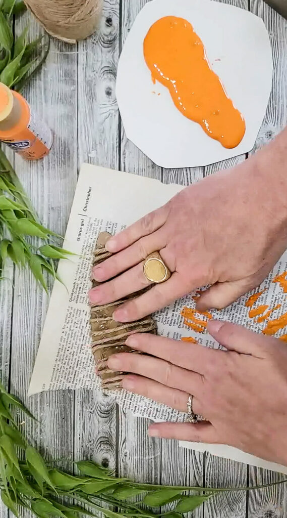 Using just a few simple supplies, you can make these gorgeous stuffed carrots for Easter and use them for years to come! #papercraft #easterdiy #budgetfriendlyeasterdecor #paperdiy