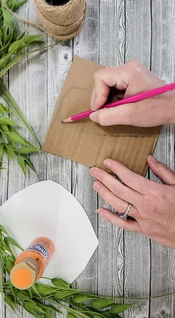 Using just a few simple supplies, you can make these gorgeous stuffed carrots for Easter and use them for years to come! #papercraft #easterdiy #budgetfriendlyeasterdecor #paperdiy