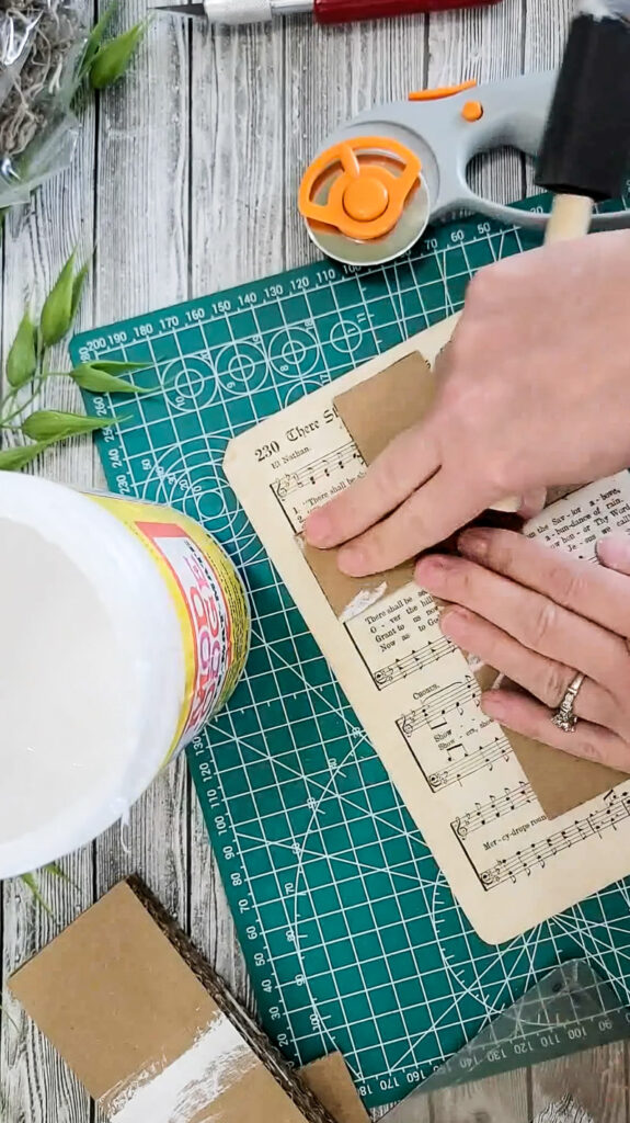 Create beautiful cross decor with only cardboard and a couple supplies! It's easier than you might think!! #cardboardcraft #easydiy #budgetfriendly #cardboard #cross #faith