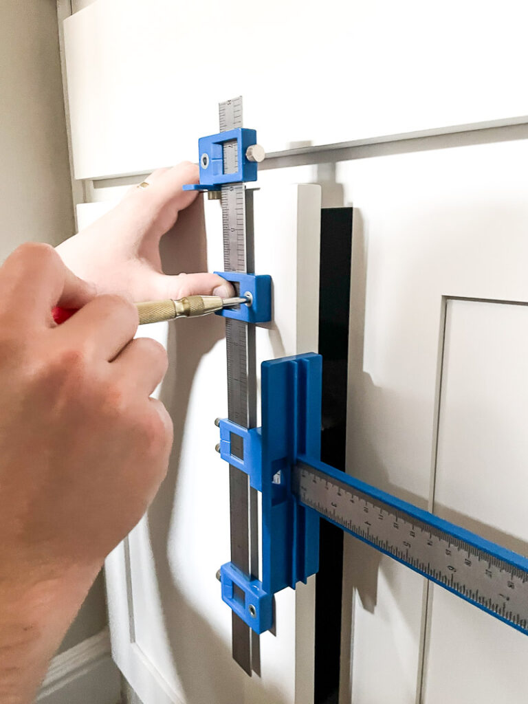 Adding beautiful hardware to your cabinets is easier than you might think... no contractor needed! Just a couple tools, a little time, and a little patience! After reading this, you'll want to add hardware to every cabinet in your home! #cabinethardware #cabinetjewelry #howto #cabinetpulls #cabinetknobs #easilyinstallcabinethardware