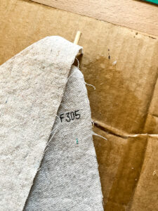 It's easy to make a DIY sailboat from cardboard, I'll show you how! Perfect for all of your summer decorating for years to come! #cardboard #sailboat #summerdecor