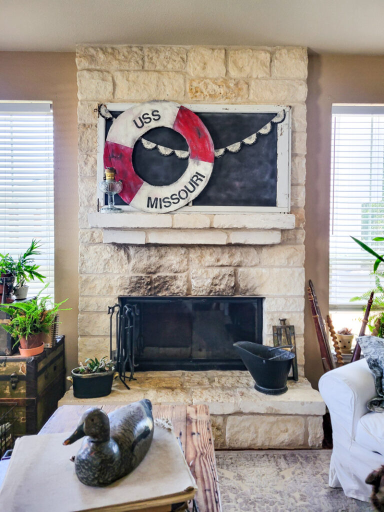 Make a life-size life preserver for vintage summer decorating. This large cardboard project will add a vintage vibe to your beach house, summer vignette or nautical decor motif. So easy and super budget-friendly. #budgetsummerdecor #beachtheme #vintagestylesummer