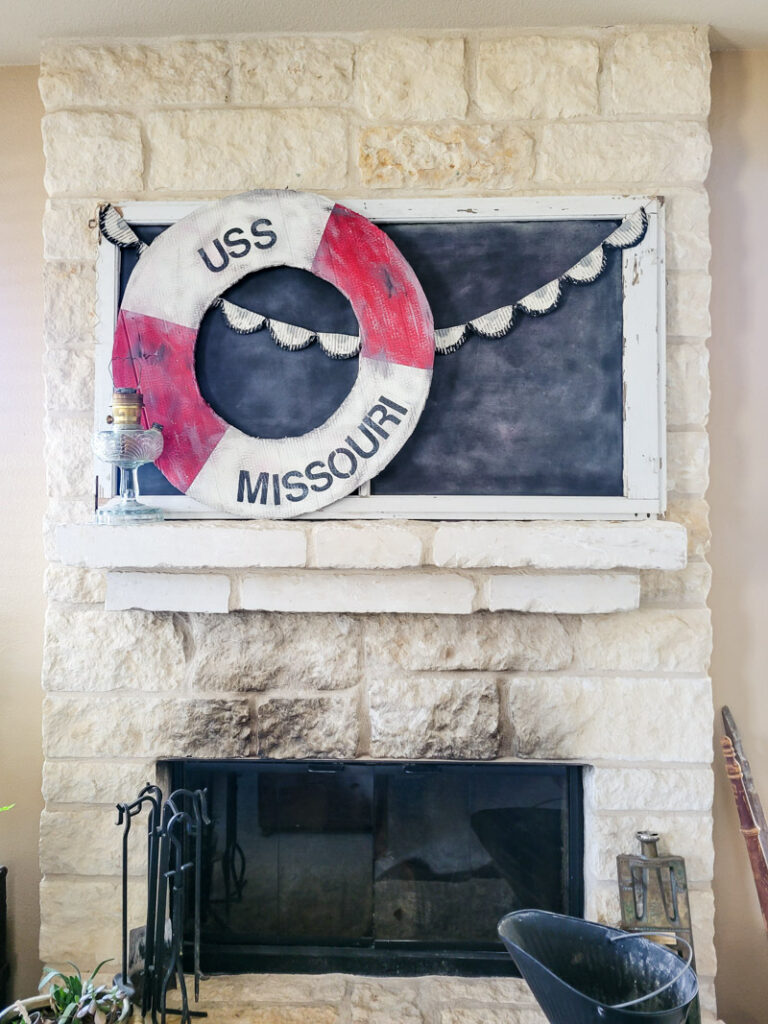 Make a life-size life preserver for vintage summer decorating. This large cardboard project will add a vintage vibe to your beach house, summer vignette or nautical decor motif. So easy and super budget-friendly. #budgetsummerdecor #beachtheme #vintagestylesummer