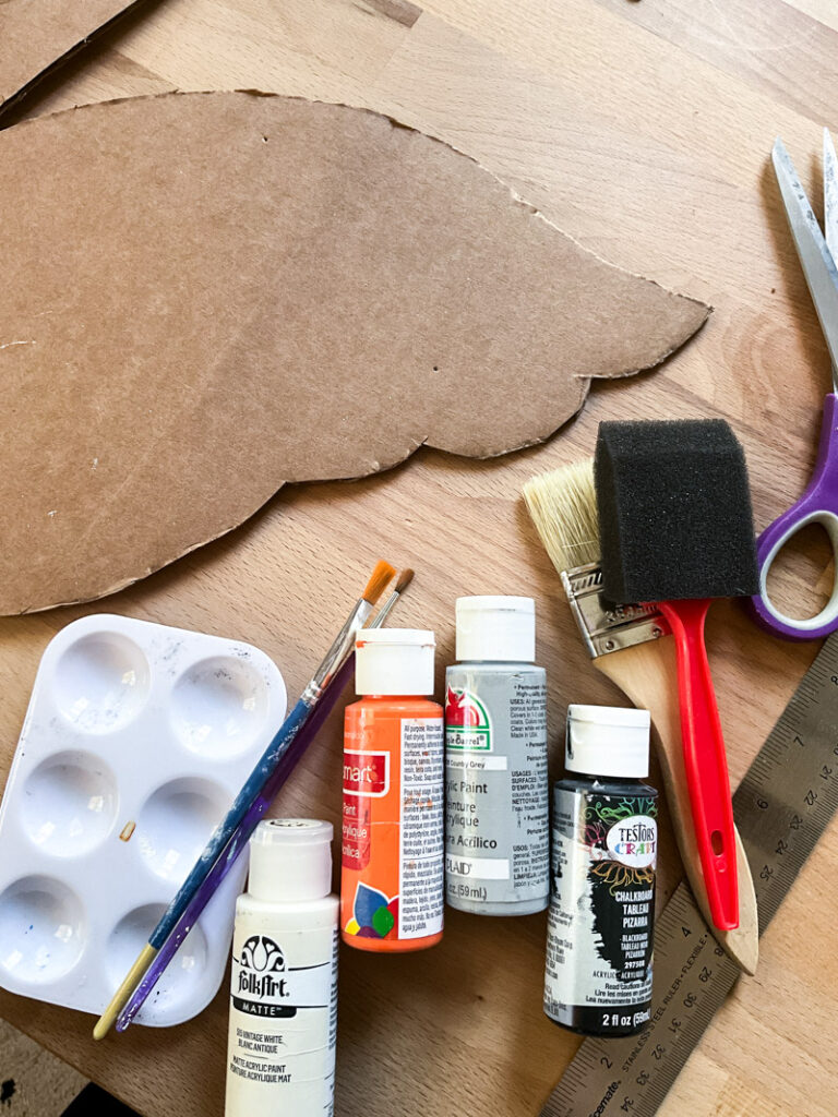 hunting for vintage swan decor and having a hard time finding it on a budget? No worries - make your own with this quick and easy cardboard project! I provide the pattern for a large swan decor piece and you do the simple work of cutting and painting! Make your vintage summer vignettes complete with this beautiful high-end craft project! #cardboarddecor #swandecor #vintagesummer