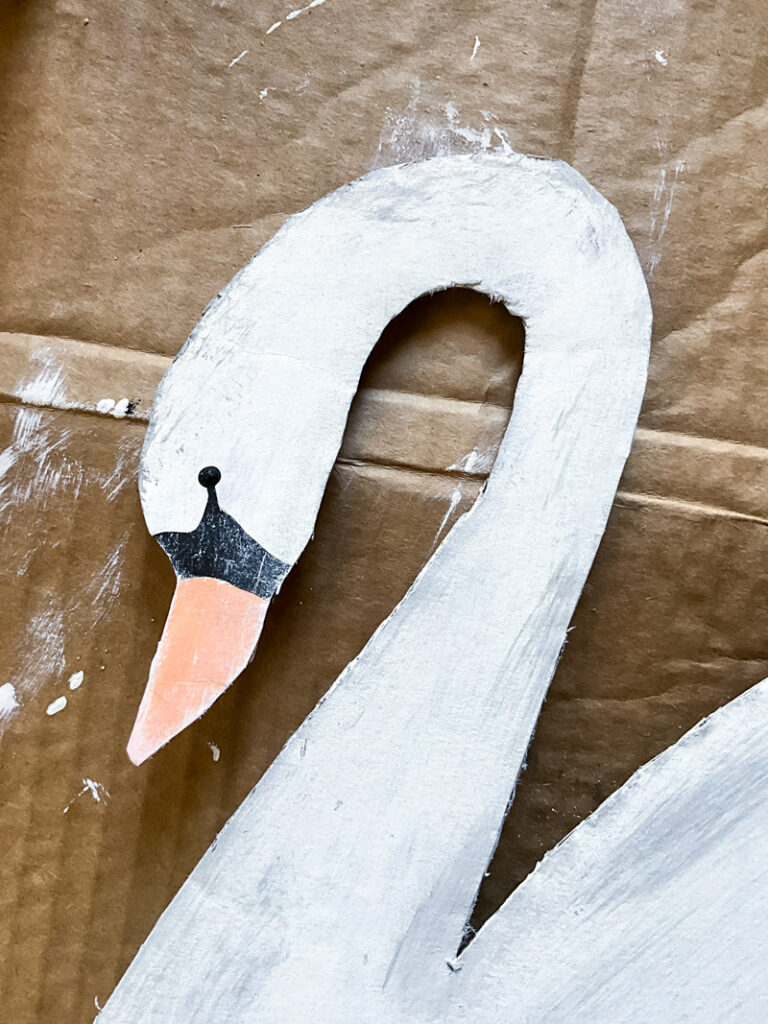 hunting for vintage swan decor and having a hard time finding it on a budget? No worries - make your own with this quick and easy cardboard project! I provide the pattern for a large swan decor piece and you do the simple work of cutting and painting! Make your vintage summer vignettes complete with this beautiful high-end craft project! #cardboarddecor #swandecor #vintagesummer